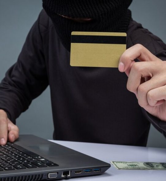 thieves-hold-credit-cards-using-laptop-computer-password-hacking-activities_1150-15154.jpg
